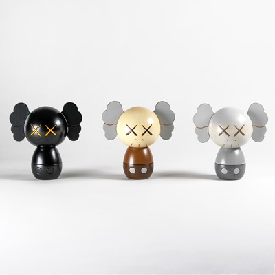 Lot 217 - Kaws (American 1974-), 'Holiday Japan Kokeshi Doll (Set of 3)', 2019