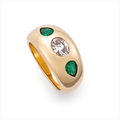 Lot 74 - Bulgari - an 18ct gold emerald and diamond ring.