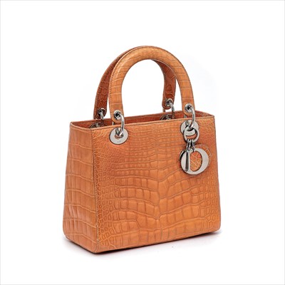 Lot 53 - Christian Dior - a limited edition peach crocodile Lady Dior handbag.