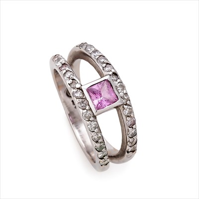 Lot 34 - A pink sapphire and diamond ring.