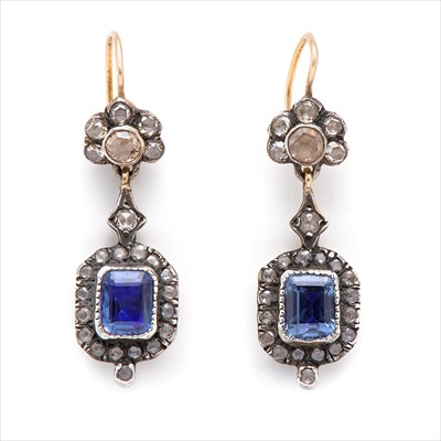 Lot 28 - A pair of foil-back sapphire and diamond earrings.