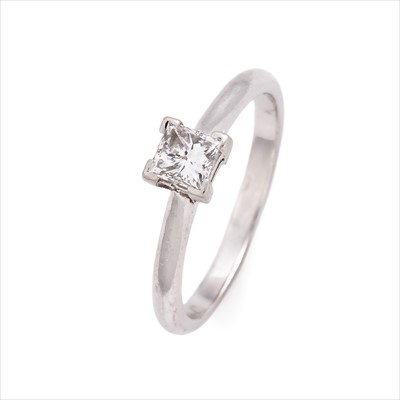 Lot 80 - A platinum diamond single-stone ring.