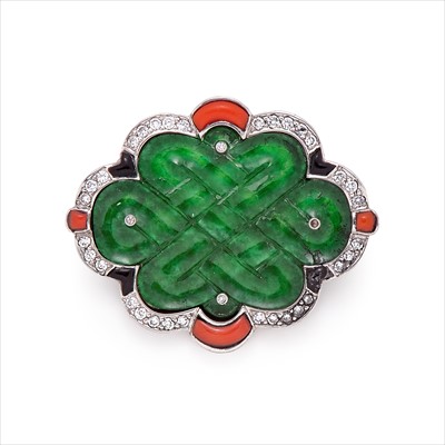 Lot 76 - A jade, coral and diamond brooch.