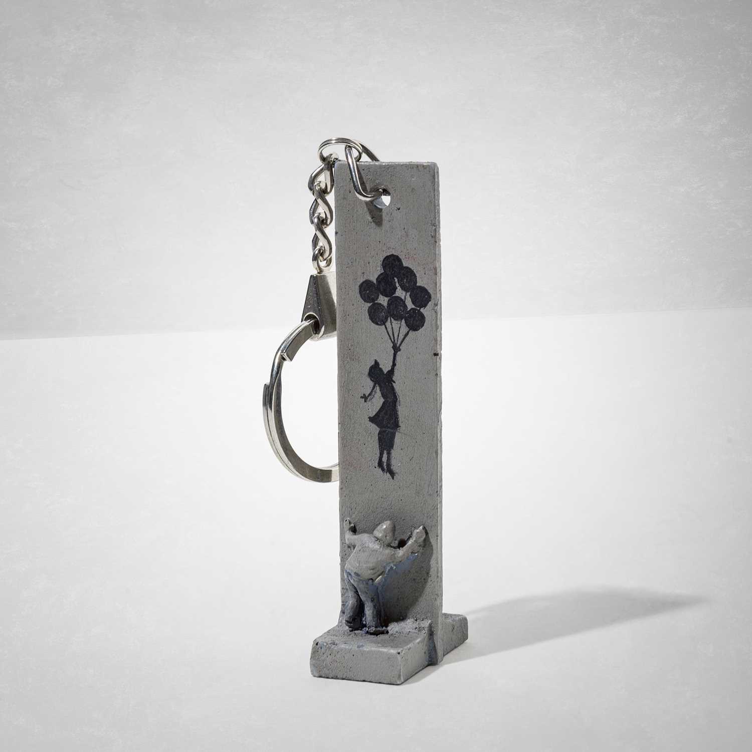Lot 73 - Banksy (British 1974 -), 'Walled Off Hotel - Key Fob Wall Section (Girl With Balloons)'