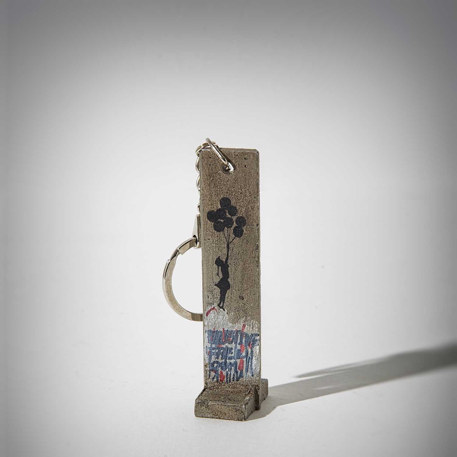 Lot 121 - Banksy (British 1974 -), 'Walled Off Hotel - Key Fob Wall Section (Girl With Balloons)'