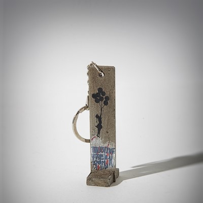 Lot 116 - Banksy (British 1974 -), 'Walled Off Hotel - Key Fob Wall Section (Girl With Balloons)'